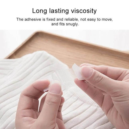 Invisible Anti-Slip Shirt Straps For Secure Wear, 85x18mm clear PET adhesive strip being peeled and applied to fabric to prevent slipping