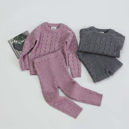 Kids Grey Casual Sweater For Autumn And Winter Wear displayed folded with matching knit pants; grey and pink kids cable-knit outfits for layering