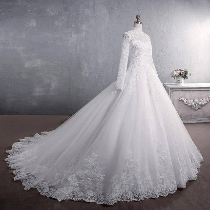 Lace Wedding Dress Stand-Up Collar For Elegant Weddings shown on white long-sleeve lace bridal gown with full train and scalloped hem