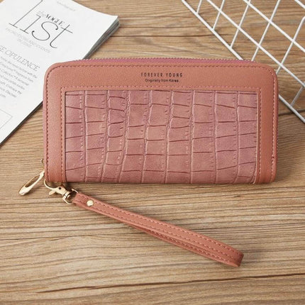 Ladies Long Zip Wallet For Everyday Use Fits Cards And Cash – pink PU zip wallet with crocodile texture, wrist strap and card slots
