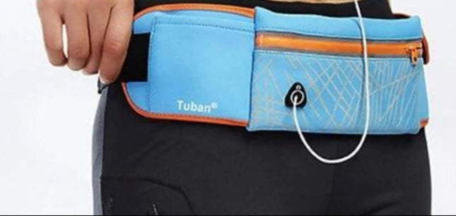 Large Capacity Outdoor Waist Pack for Jogging and Gym in blue water-resistant polyester with zipper pocket and earphone port, shown worn on waist