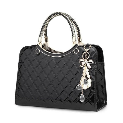 Large Capacity PU Leather Handbag For Everyday Use - black quilted PU leather tote with gold handles and decorative charm, multiple compartments