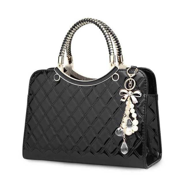 Large Capacity PU Leather Handbag For Everyday Use - black quilted PU leather tote with gold handles and decorative charm, multiple compartments