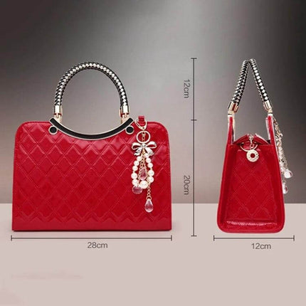 Large Capacity PU Leather Handbag For Everyday Use red quilted handbag with jeweled charm, metal braided handles and multiple compartments, 28x12x20cm