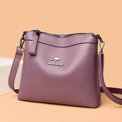 Large Crossbody Shoulder Handbag With Multiple Pockets For Daily Use - purple PU horizontal square bag with stitched accents and adjustable strap