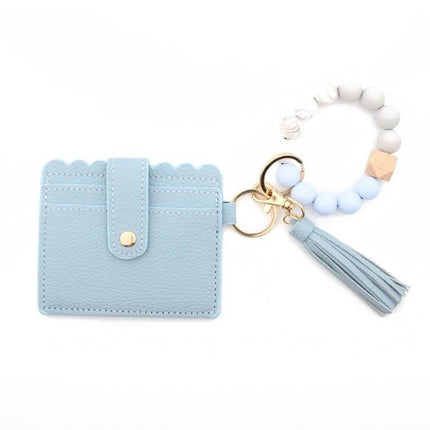 PU Tassel Silicone Bead Bracelet Wallet With Keychain Sunflower light blue PU leather card holder with sunflower charm, tassel and silicone bead bracelet keychain