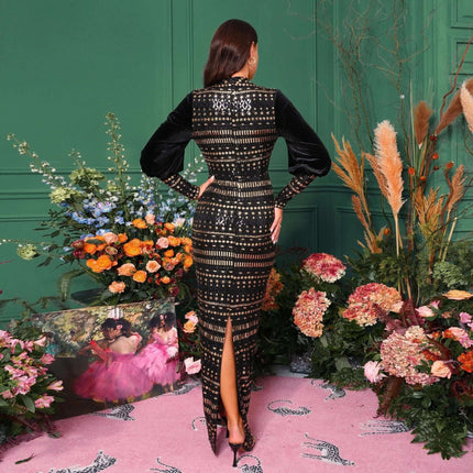 Long Sleeve Round Neck Sequined Slit Evening Dress Black model back view with slit and subtle sequin shine at formal event