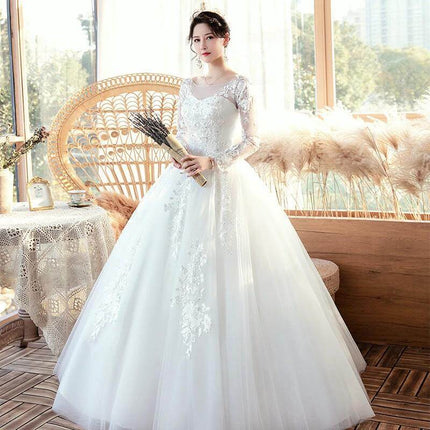 Long Sleeve Wedding Dress With Train For Your Wedding Day - bridal gown with modest long sleeves and flowing train, ideal for ceremonies and portraits