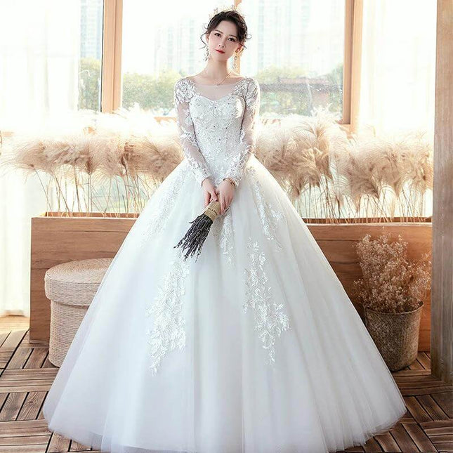 Long Sleeve Wedding Dress With Train For Your Wedding Day - lace long-sleeve ball gown with flowing train, modest coverage for ceremonies and bridal portraits