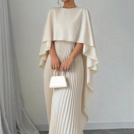 Loose Batwing Sleeve Dress For Everyday Commute S-XXL in milky white styled with pleated skirt, cape-like batwing sleeves, necklace and small white handbag