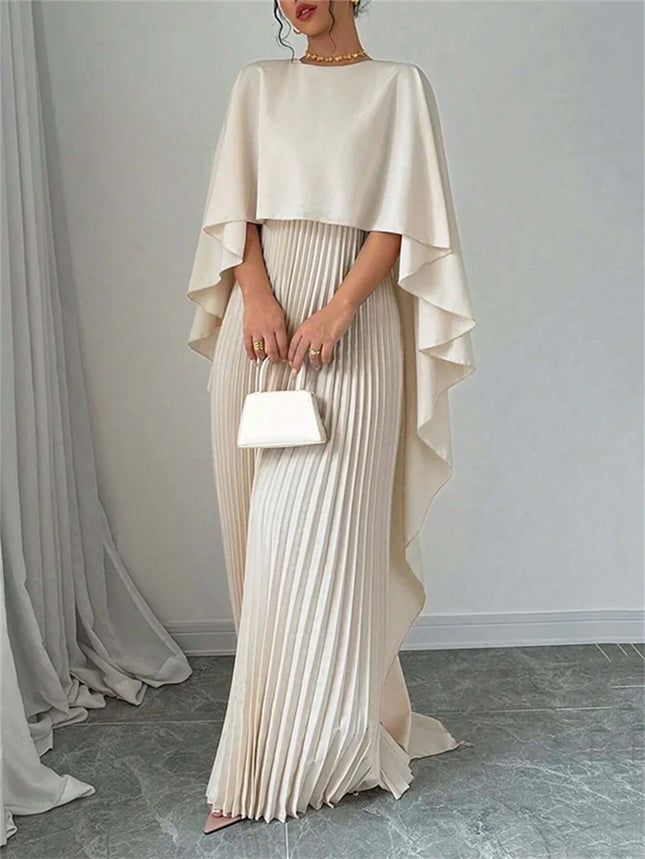 Loose Batwing Sleeve Dress For Everyday Commute S-XXL model wearing milky white pleated floor-length dress with cape-style batwing sleeves and small white handbag