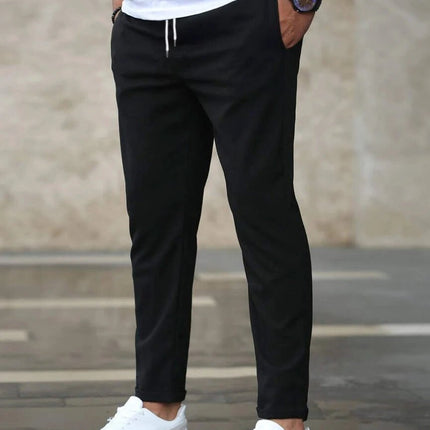 Men's Casual Drawstring Trousers With Pockets Slim Fit For Everyday Wear in black slim straight cut, mid-waist drawstring and side pockets