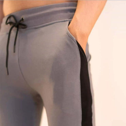 Men Training Pants Cotton Blend For Daily Running Wear - slim mid-rise grey training pants with black side stripe and drawstring