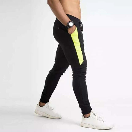 Men Training Pants Cotton Blend For Daily Running Wear — black slim mid-rise joggers with neon side panel, breathable cotton-blend for workouts and casual wear