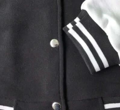 Men's Loose Fit Baseball Jacket For Everyday Casual Wear close-up of black cotton jacket with white striped cuff and snap buttons