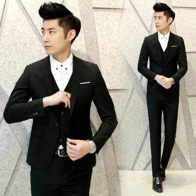 Men's Slim Fit Three-Piece Suit for Everyday Leisure in black slim-fit jacket, waistcoat and trousers on male model