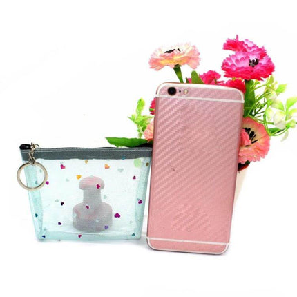 Mini Waterproof PVC Jelly Coin Purse Transparent Zipper Bag shown with pink smartphone and flowers, clear heart-print coin pouch with keyring