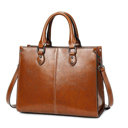 Oil Wax Leather Sling Handbag For Everyday Shoulder Use - brown oil-waxed cowhide compact sling with top handles and shoulder strap