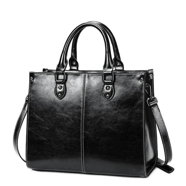 Oil Wax Leather Sling Handbag For Everyday Shoulder Use black oil-waxed cowhide sling with top handles and detachable shoulder strap