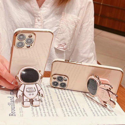 iPhone Case With Astronaut Stand For Hands-Free Video Watching showing rose gold electroplated soft-shell case with 3D astronaut stand supporting phone