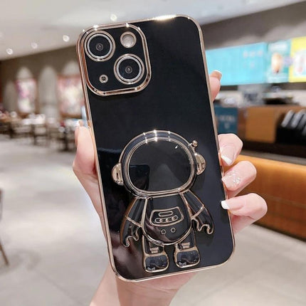Astronaut Phone Case With Stand For Hands-Free Viewing - sleek black electroplated soft-shell with 3D astronaut fold-out stand for video and recipes