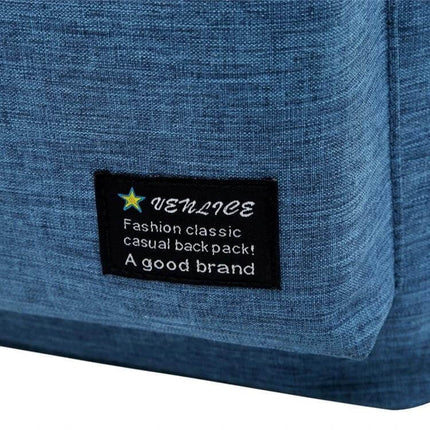 Outdoor Casual Notebook Tablet Backpack With Anti Theft Pocket close-up of blue fabric and brand patch showing texture and front pocket
