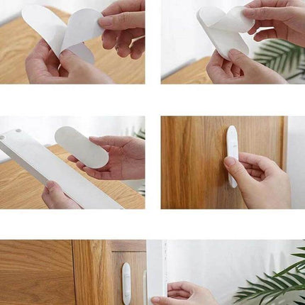 Outlet Holder Wall Mount For Sockets And Routers 10x4x0.7cm - hands applying adhesive strip to wall-mounted ABS plastic holder for cables and remotes