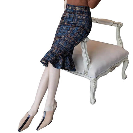 Oversized Stretch Print Fishtail Ruffled Hip Skirt A-Line Casual navy print midi skirt with fishtail hem and hip ruffle styled on chair