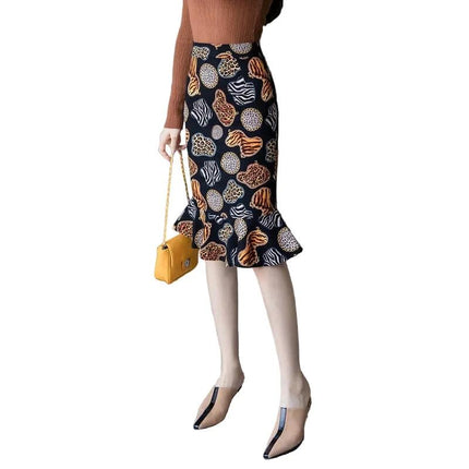 Oversized Stretch Print Fishtail Ruffled Hip Skirt A-Line Casual in navy print with hip ruffle and flared fishtail hem, styled with sweater and bag