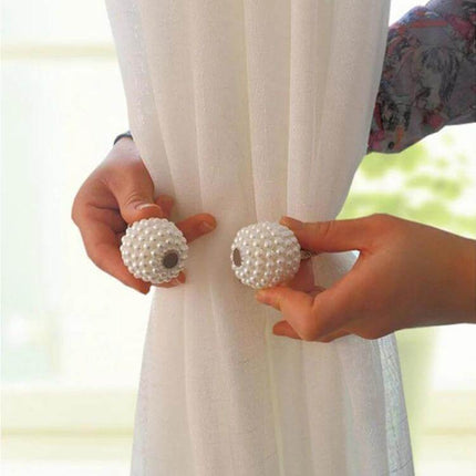 Pearl Magnetic Buckle Curtain Strap For Easy Curtain Holdbacks shown holding sheer white curtain with pearl-beaded magnetic buckle