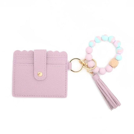 PU Tassel Silicone Bead Bracelet Wallet With Keychain Sunflower in pastel pink PU leather card holder with sunflower charm, tassel and silicone bead wristlet
