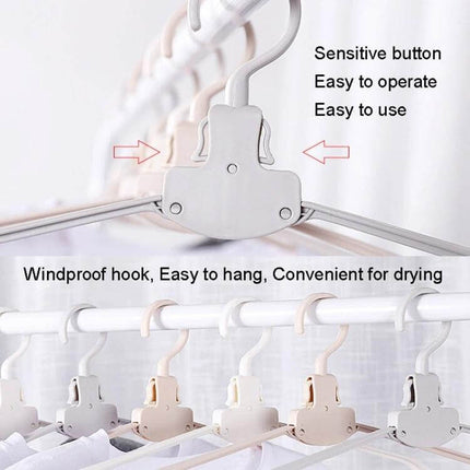 Plastic Travel Folding Clothes Hanger With Wide Shoulders shown folded and unfolded on rod, windproof hook and wide-shoulder design for travel and compact drying