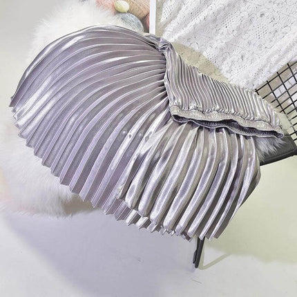 Pleated Satin Skirt, High Waist For Spring And Summer in metallic silver pleated glossy satin shown flat with stitched folds
