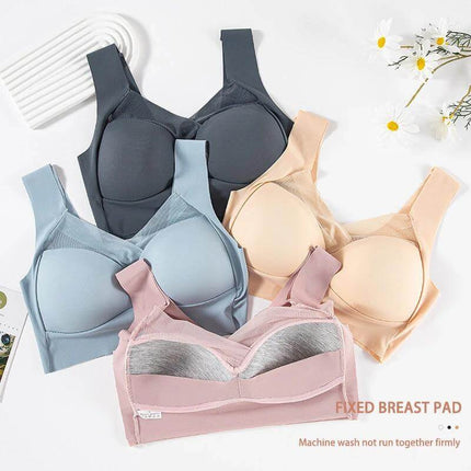Plus Size Wireless Seamless Ice Silk Bra With Adjustable Straps in gray, light blue, pink and skin colors laid flat showing molded cups and adjustable straps