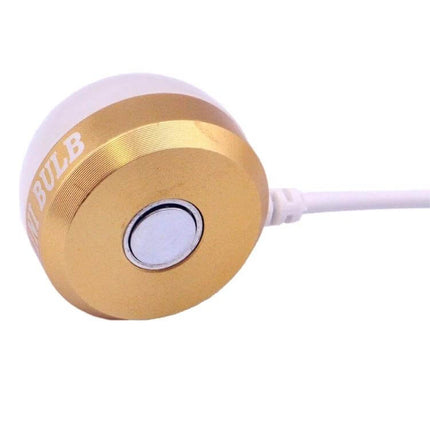 Portable USB Reading Light With Magnetic Base Warm White shown close-up of gold magnetic base with USB-A cable attached