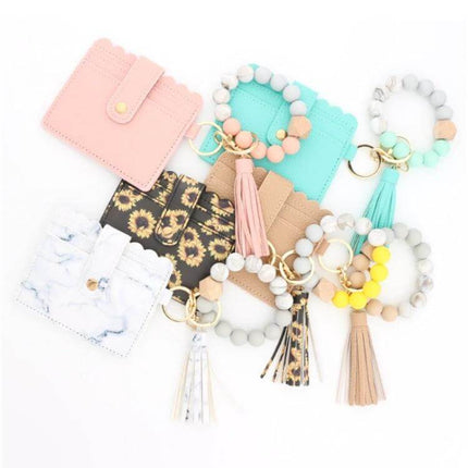 PU Tassel Silicone Bead Bracelet Wallet With Keychain Sunflower - assorted colors PU tassel wallet with silicone bead bracelet, sunflower print and keychain