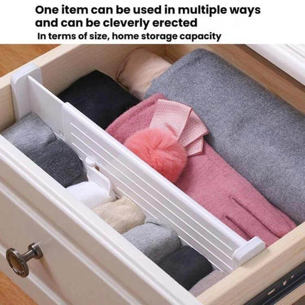 Retractable Drawer Storage Partition Board For Drawer Organization in white divider organizing socks scarves in a wooden drawer