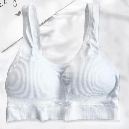Seamless Wireless Ribbed Bra For Everyday Comfort M L in white, ribbed wireless stretch fabric, light support and smooth silhouette