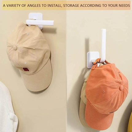 Baseball Hat Wall Hook Self-Adhesive 2-Pack Black/White showing white self-adhesive hooks holding caps on a wall for organized storage