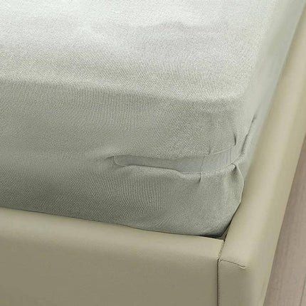 Sheet Fixer Clip Anti Slip Keeping Sheets In Place shown securing fitted sheet corner with transparent anti-slip clip on bed