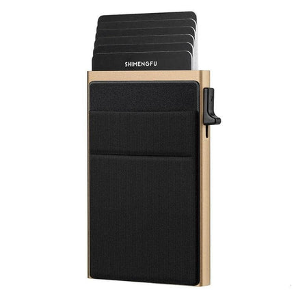 Slim Metal Pop Up Card Holder RFID Blocking Wallet in gold with black fabric pocket, aluminum frame and pop-up card tray for quick access