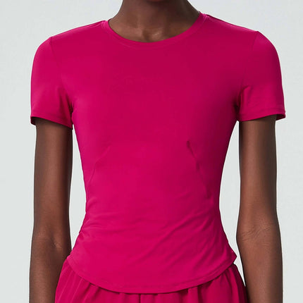 Alt Tag: Small Waist Yoga Top With Short Sleeves In Black For Studio Practice - fitted short sleeve studio shirt in bright pink on model