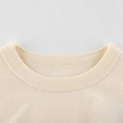 Summer Girls Short-Sleeved Rice Apricot T-Shirt Cotton close-up of soft cotton crew neckline for girls aged 3–8, breathable summer tee