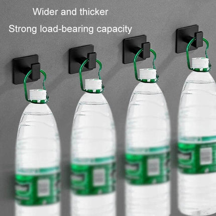 Thickened Solid Hooks No-Hole Wall Hanger For Towels And Clothes — black space-aluminum no-drill hooks holding heavy water bottles, strong load-bearing