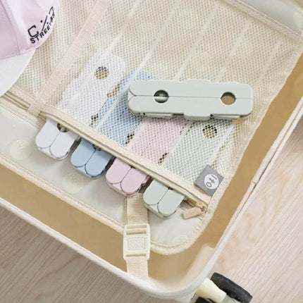 Travel Foldable Clothes Hanger On The Go Anti Skid compact ABS foldable travel hanger set packed in suitcase for drying shirts socks