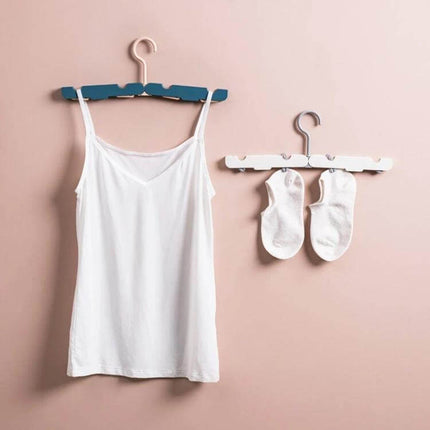 Travel Foldable Clothes Hanger On The Go Anti Skid showing white tank top and socks drying on compact foldable ABS hangers