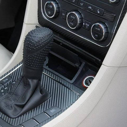 Universal Silicone Gear Shift Knob Cover Nonslip Grip installed on car gear lever with textured dotted surface for secure hold