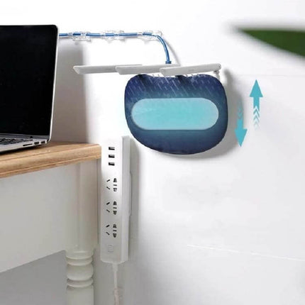 Outlet Holder Wall Mount For Sockets And Routers 10x4x0.7cm shown mounted holding a router and organizing cables in a home office
