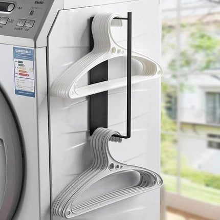 Wall Mounted Clothes Hanger Rack With Double Layer Storage mounted on washing machine side holding multiple plastic hangers, space-saving laundry organization