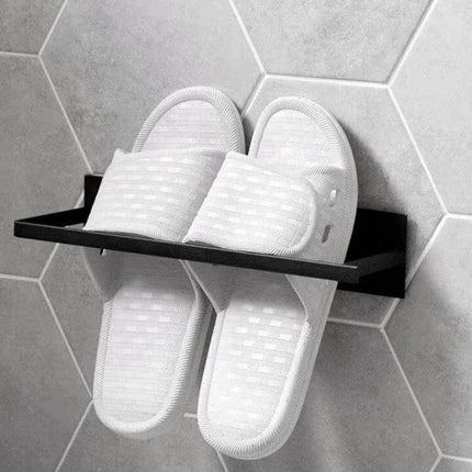 Wall Mounted Clothes Hanger Rack With Double Layer Storage holding slippers on a slim black double-layer wall organizer for entryway or bathroom